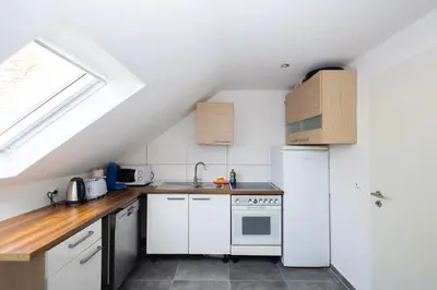 Küche/Küchenzeile in der Unterkunft Häusliches Loft Wohnung Apartment im Herzen von Ratingen