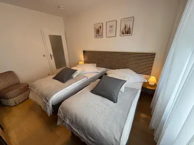Ein Bett oder Betten in einem Zimmer der Unterkunft Relax Center Suite