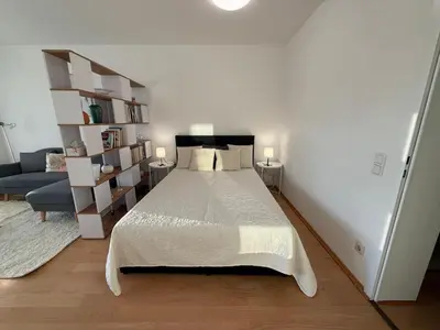Ein Bett oder Betten in einem Zimmer der Unterkunft Relax Center Suite