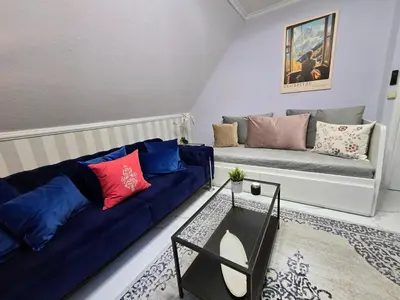 Ein Sitzbereich in der Unterkunft HR Haus unter den Linden