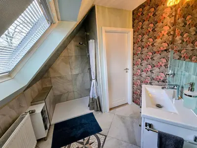 Ein Badezimmer in der Unterkunft HR Haus unter den Linden