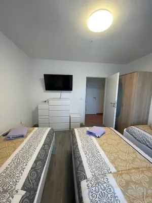 Ein Bett oder Betten in einem Zimmer der Unterkunft Monteurwohnung für 5 Personen, Marl