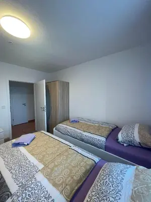 Ein Bett oder Betten in einem Zimmer der Unterkunft Monteurwohnung für 5 Personen, Marl