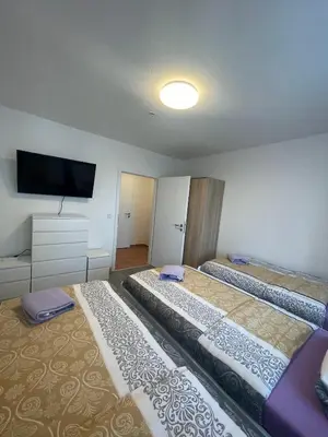 Ein Bett oder Betten in einem Zimmer der Unterkunft Monteurwohnung für 5 Personen, Marl