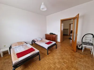 Ein Bett oder Betten in einem Zimmer der Unterkunft K&K Unterkunft GbR, Wohunung 3