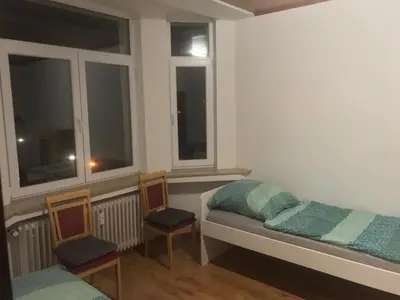 Ein Bett oder Betten in einem Zimmer der Unterkunft K&K Unterkunft GbR, Wohunung 3