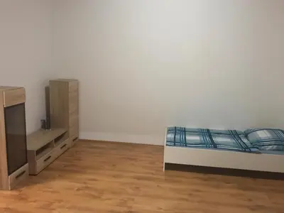 Ein Bett oder Betten in einem Zimmer der Unterkunft K&K Unterkunft GbR, Wohunung 3