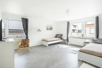 Ein Sitzbereich in der Unterkunft VAZ Apartments Haus Langerfeld für Monteure, TV, WLAN, Küche, nahe 3M und EDE