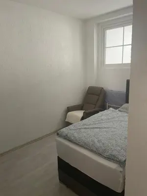 Ein Bett oder Betten in einem Zimmer der Unterkunft Nähe SG-Ohligs BHF FeWo