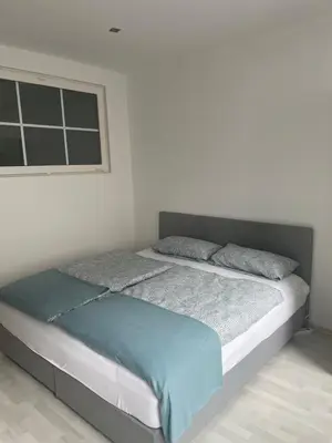 Ein Bett oder Betten in einem Zimmer der Unterkunft Nähe SG-Ohligs BHF FeWo