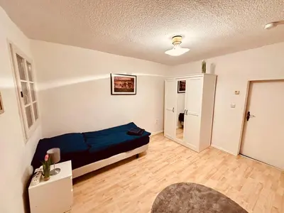 Ein Bett oder Betten in einem Zimmer der Unterkunft Gästehaus zum Alten Feilenhauer