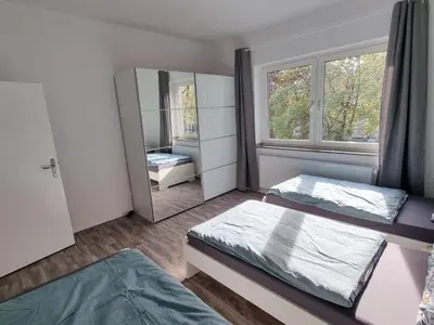 Ein Bett oder Betten in einem Zimmer der Unterkunft Viktoria's Appartment in OB-Mitte