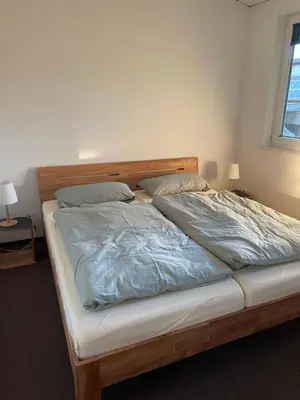 Ein Bett oder Betten in einem Zimmer der Unterkunft Landhaus am Loh